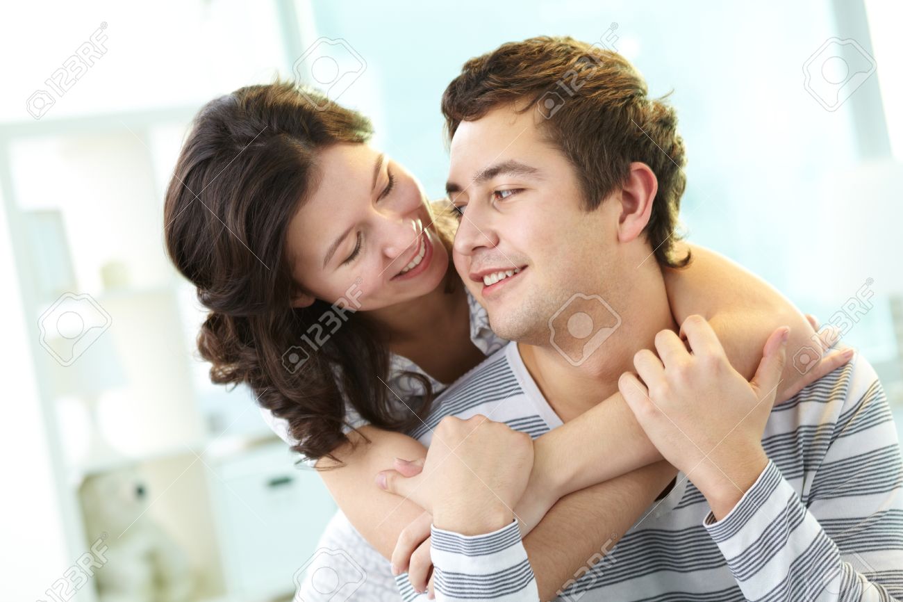 Girl and guy hugging