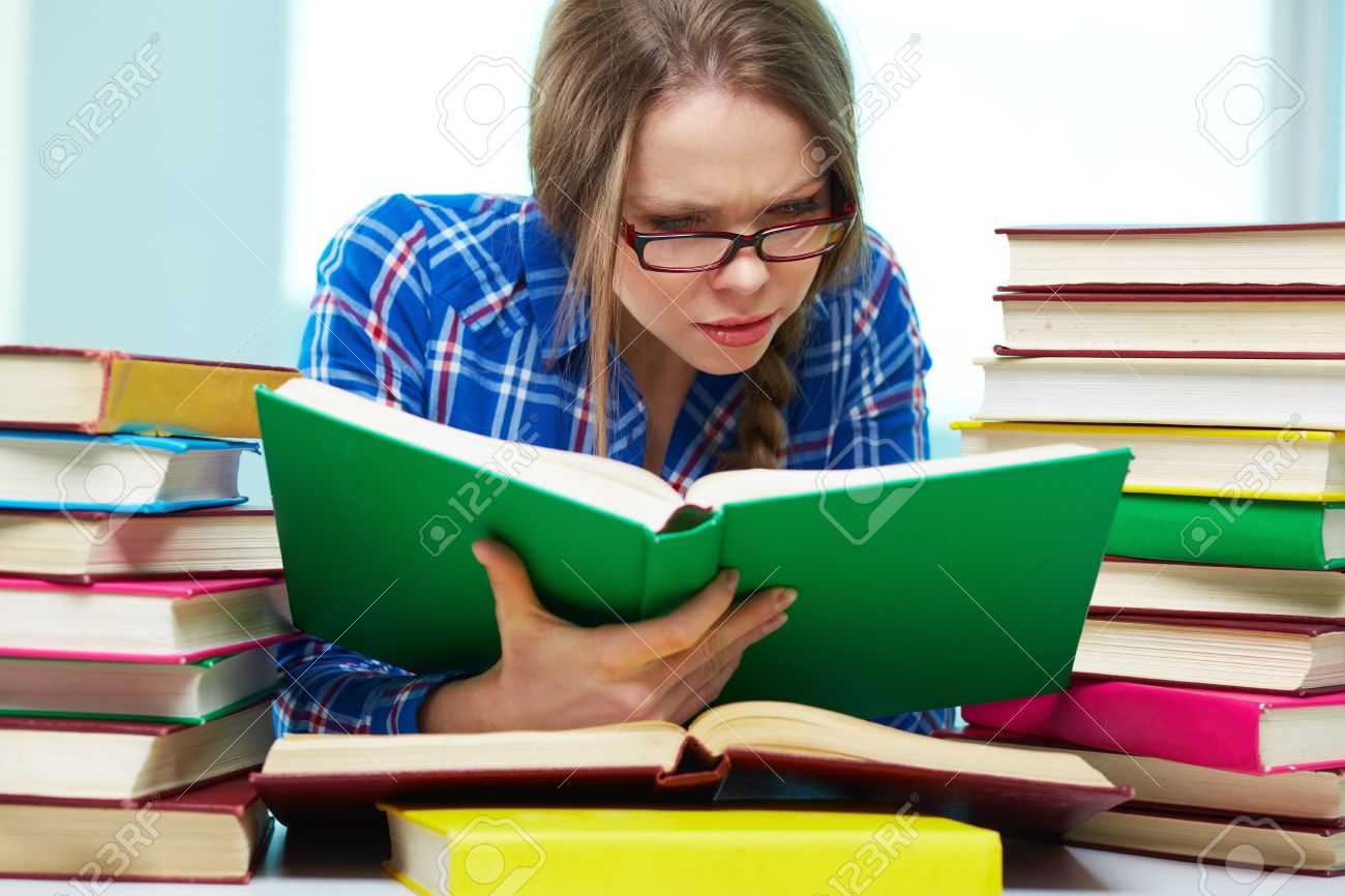Diligent Student Being Absorbed In Studying Stock Photo, Picture And Royalty Free Image. Image 18729948.