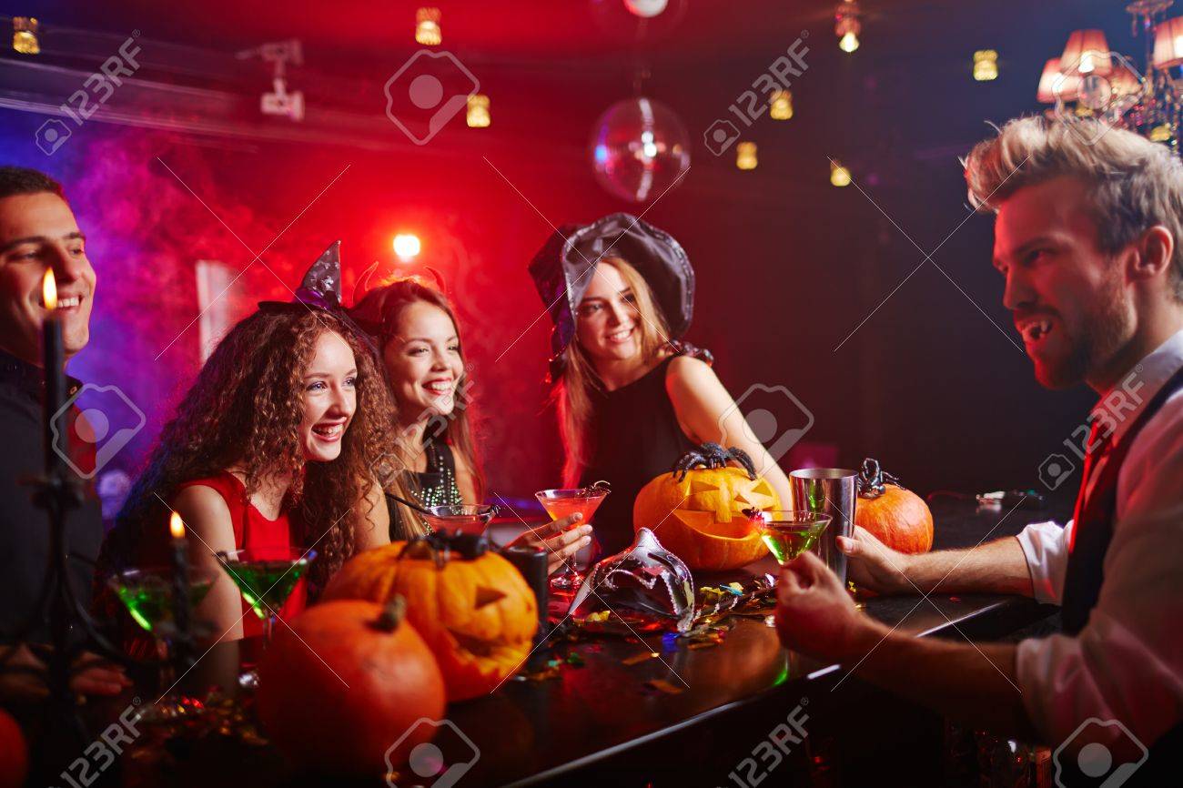 disguised vampire serving drinks to witches at halloween night stock photo 44207200 - Halloween Night Party disguised vampire serving drinks to witches at halloween night stock photo 44207200 - Halloween Night Party