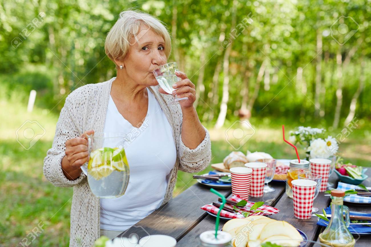 Thirsty Mature Woman Drinking Homemade