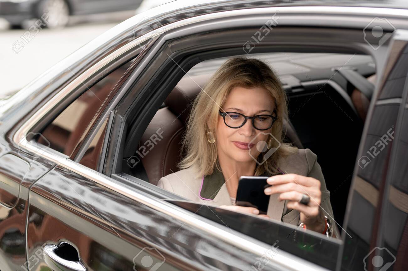 mature wife in backseat