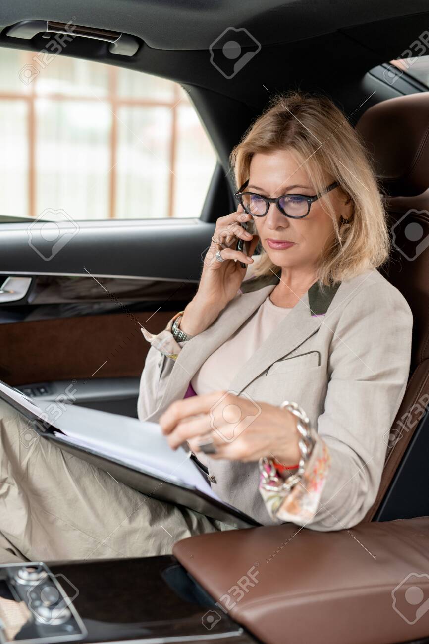 Taxi Cab And Phoning Stock Photo