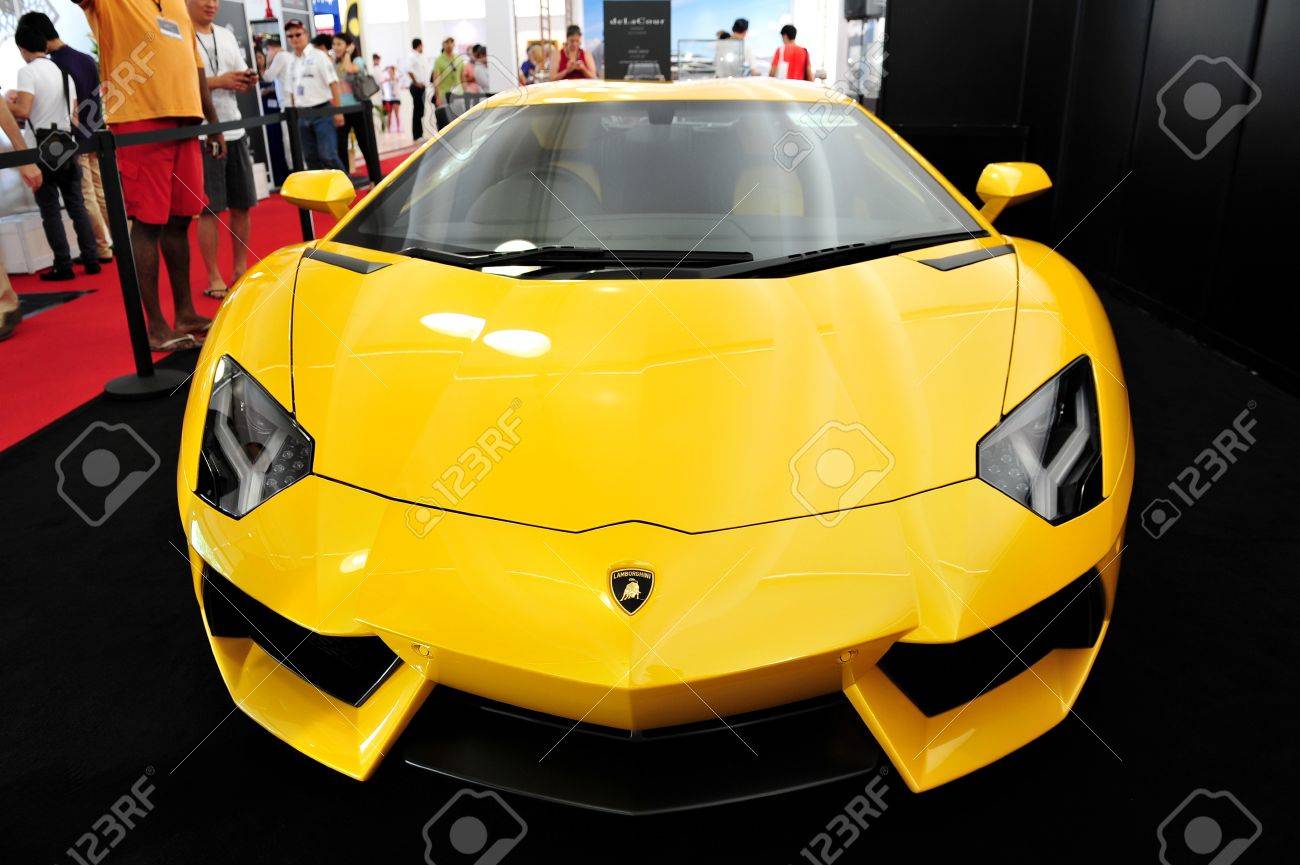 Bright yellow Lamborghini Aventador on display at the Singapore..