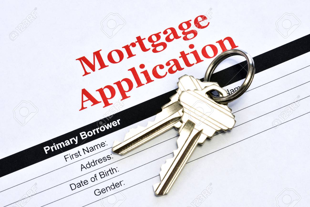 Real Estate Mortgage Application Loan Document With House Keys - 106385139 Real Estate Mortgage Application Loan Document With House Keys - 106385139