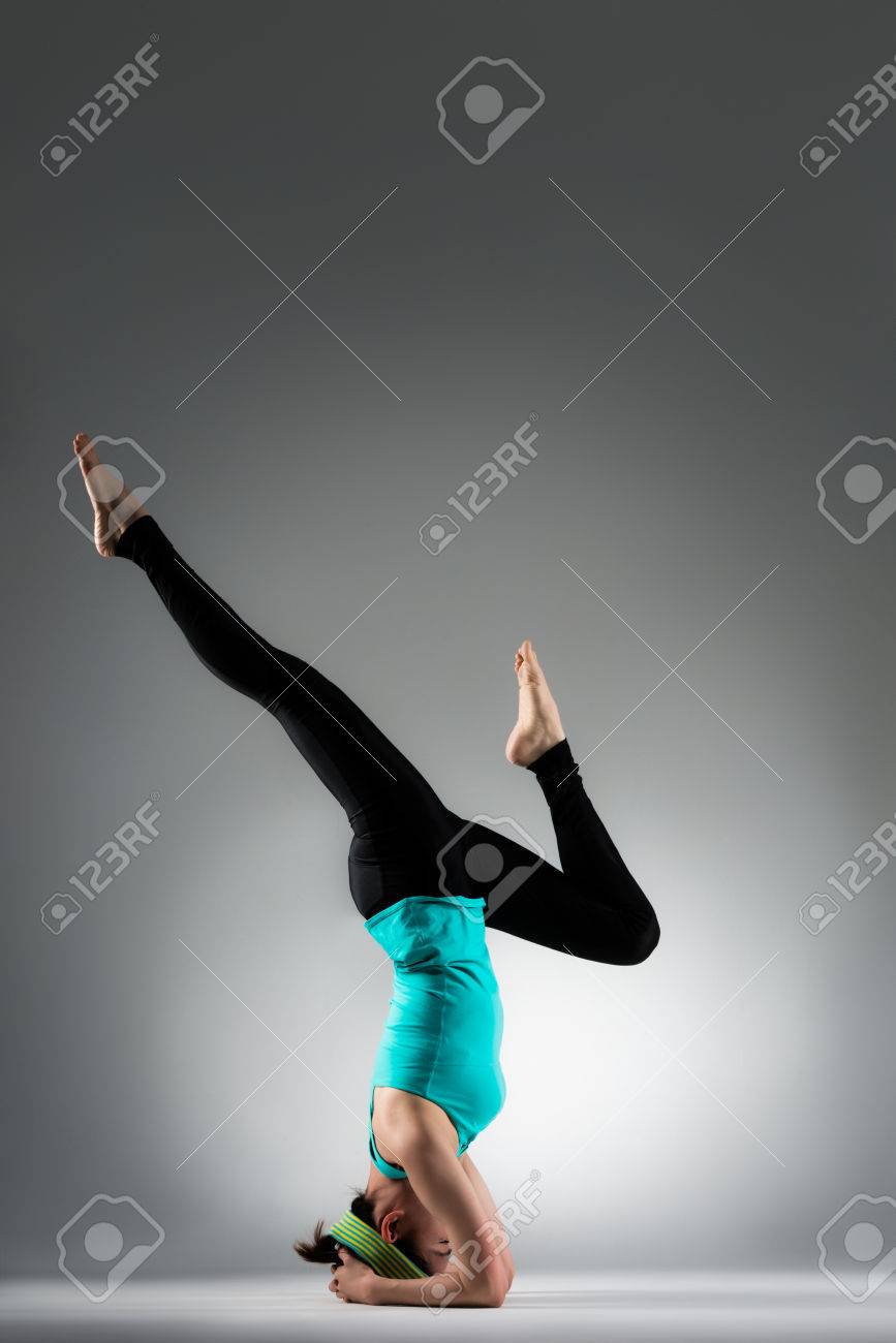 Pretty Yoga Fitness Coach Woman Using Handstand Posing To Stretching Legs And Workout Personal Body Muscle Pretty Yoga Fitness Coach Woman Using Handstand Posing To Stretching Legs And Workout Personal Body Muscle
