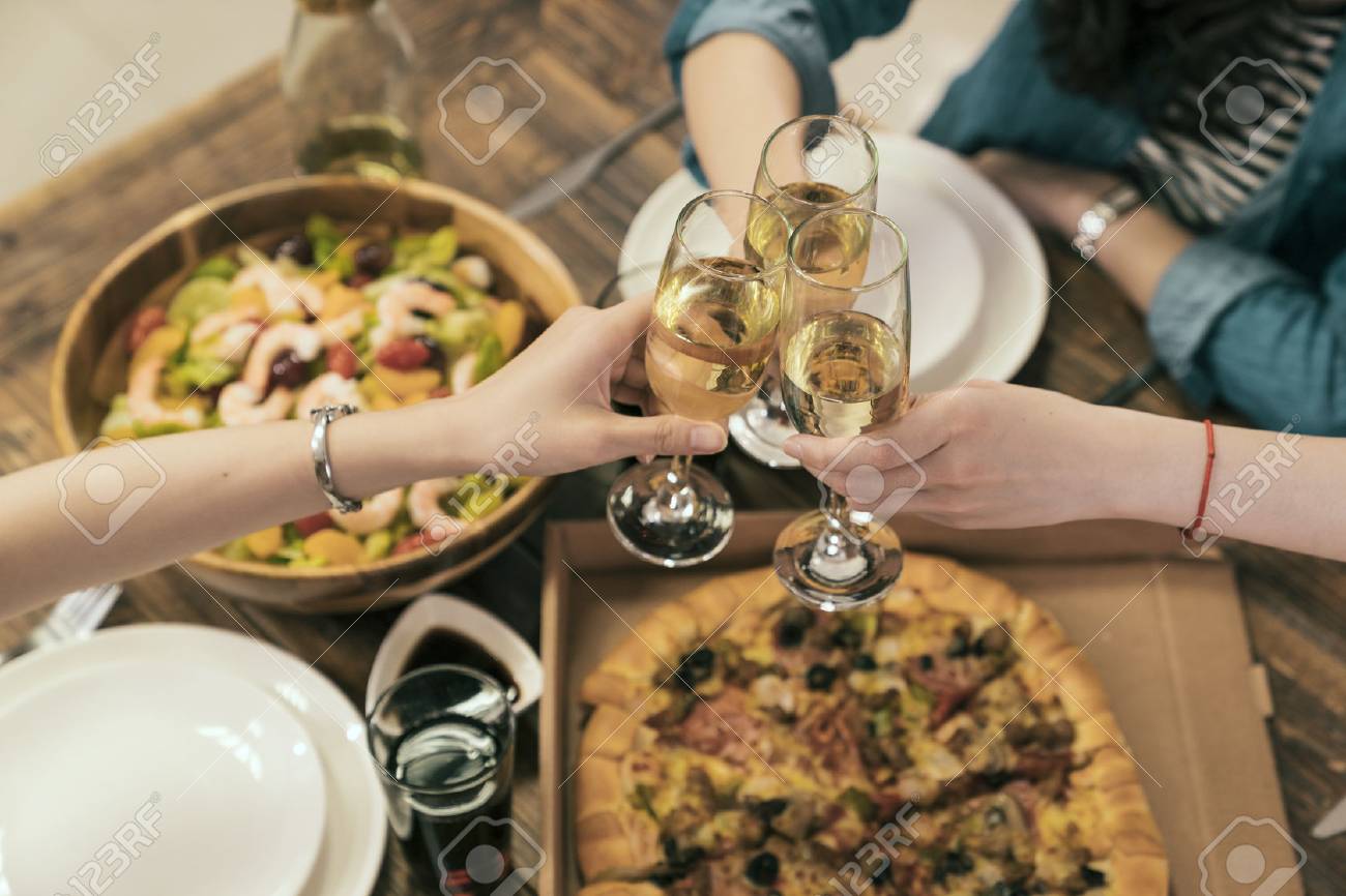 above view of Asia sisters friends cheer up for successful business or New Year eve. dinner table with champagne. - 91114237 above view of Asia sisters friends cheer up for successful business or New Year eve. dinner table with champagne. - 91114237