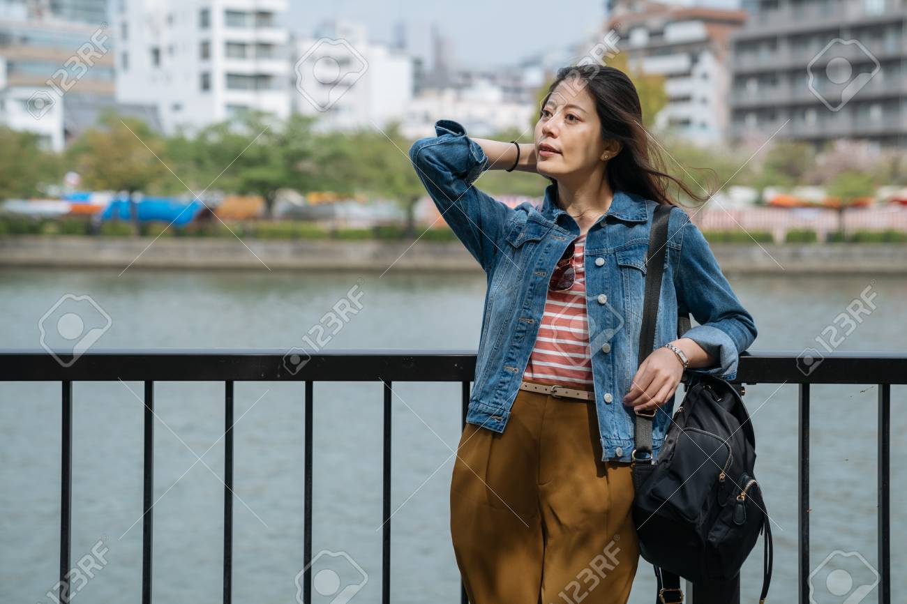 C.Y.Ronnie.WClean River With Winds Blowing Hair photo