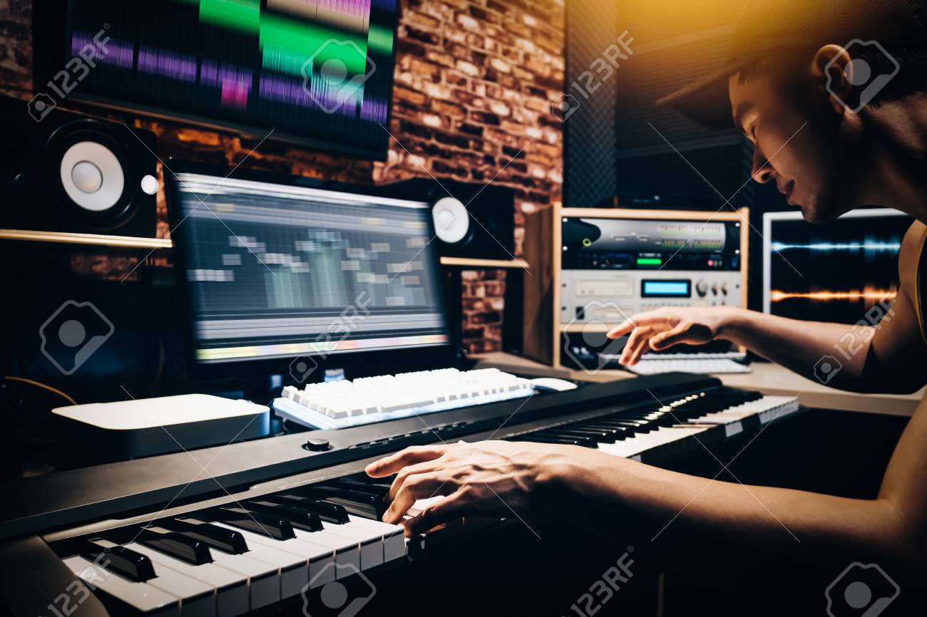 Asian Male Music Arranger Hands Composing Song On Midi Piano Stock Photo Picture And Royalty Free Image Image 100737425
