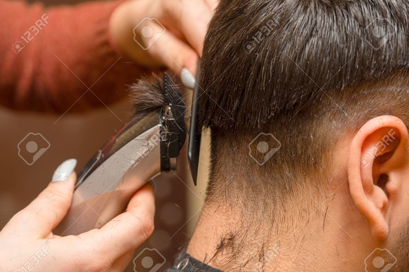 cutting hair with electric trimmers