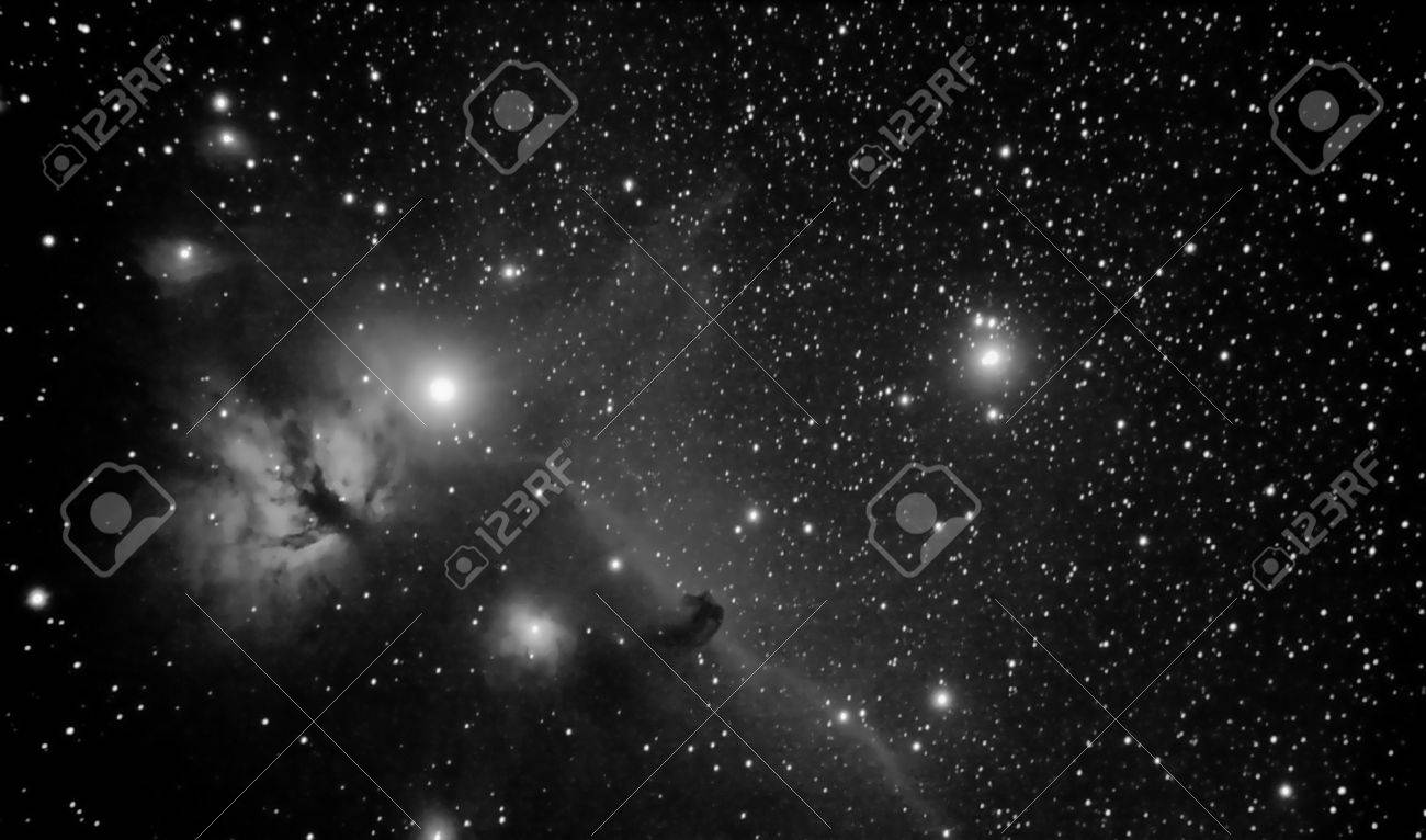 real picture taken by telescope of famous region in orion constellation that includes horsehead and flaming tree nebulaes - 17907256 real picture taken by telescope of famous region in orion constellation that includes horsehead and flaming tree nebulaes - 17907256