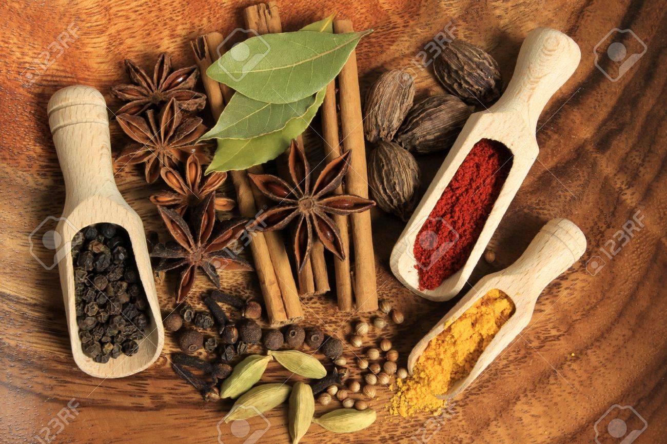 Cooking ingredients - warm colours of herbs and spices. - 9764622 Cooking ingredients - warm colours of herbs and spices. - 9764622