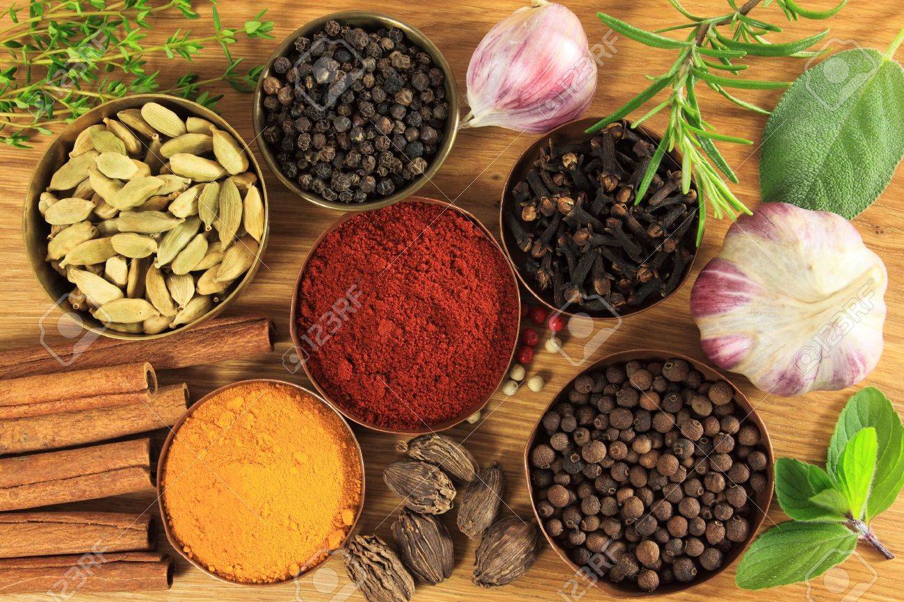 Spices and herbs in metal bowls. Food and cuisine ingredients. Colorful natural additives. - 10359227 Spices and herbs in metal bowls. Food and cuisine ingredients. Colorful natural additives. - 10359227