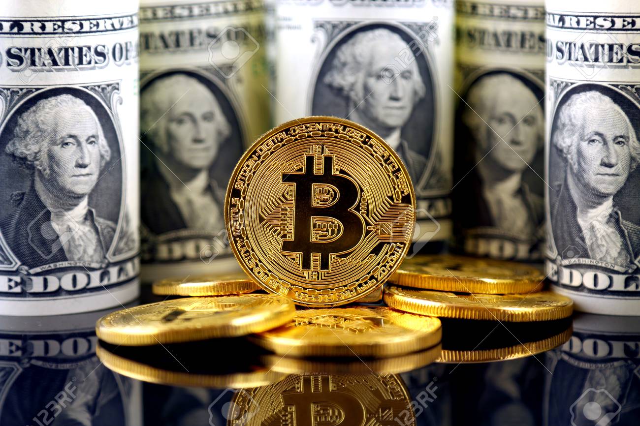 Physical Version Of Bitcoin (new Virtual Money) And Banknotes Of One  Dollar. Exchange Bitcoin For A Dollar. Conceptual Image For Worldwide  Cryptocurrency And Digital Payment System. Stock Photo, Picture and Royalty  Free