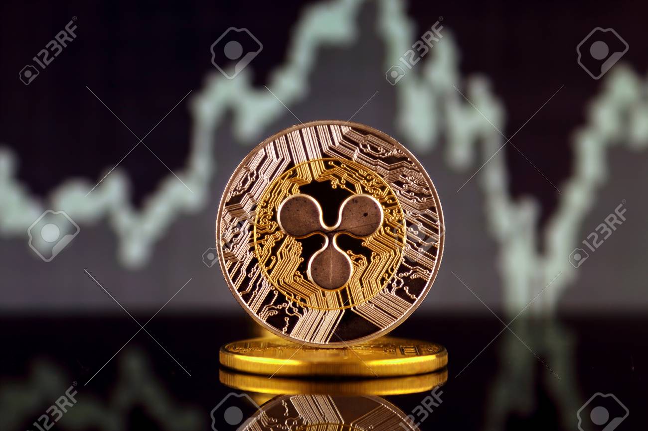 リップルの物理バージョン（XRP）、新しい仮想通貨。世界的な暗号通貨とデジタル決済システムの概念的なイメージ。の写真素材・画像素材 Image  99577117