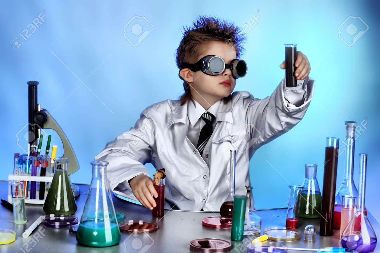 Educational theme: funny teen, medicine, science. Shot in a studio. - 4829076 Educational theme: funny teen, medicine, science. Shot in a studio. - 4829076
