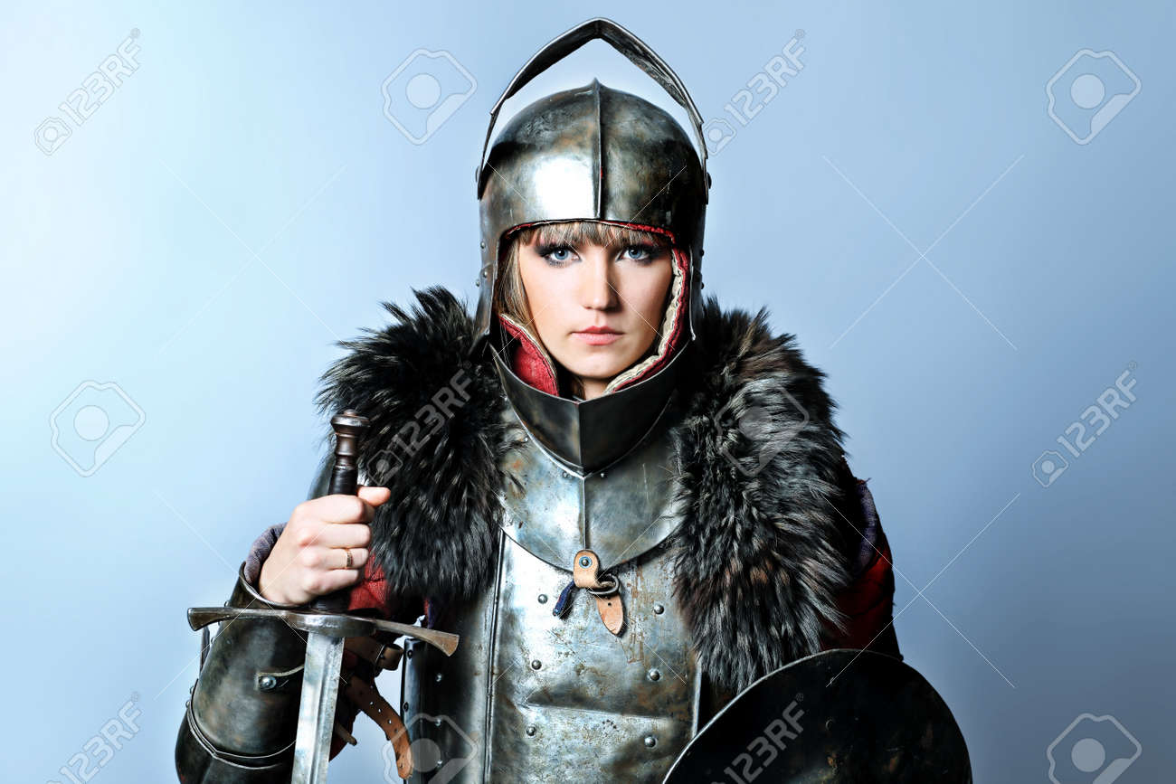 Portrait Of A Medieval Female Knight In Armour Over Grey Background. Stock  Photo, Picture and Royalty Free Image. Image 8492946.