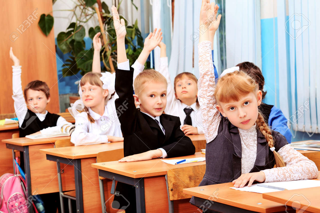 children at school during the lesson stock photo picture and