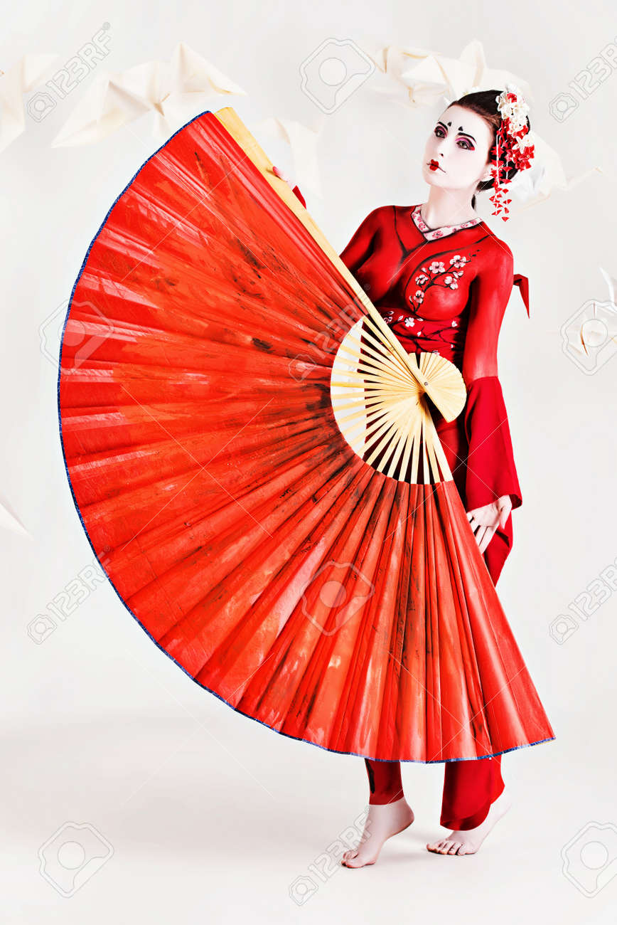 Art Portrait Of A Stylized Japanese Geisha With Fan. Body Painting Project.  Stock Photo, Picture and Royalty Free Image. Image 20623432., image size:868x1300