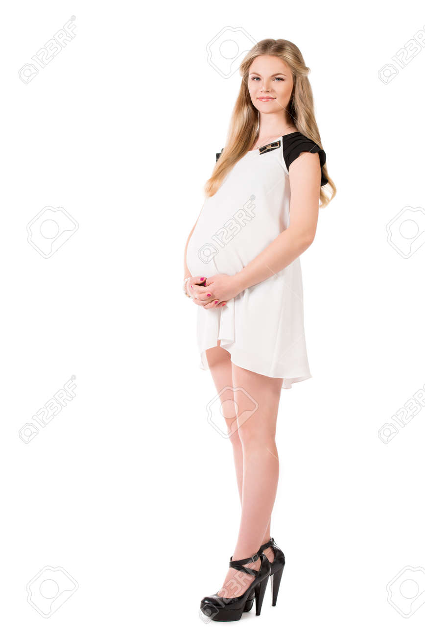 奇跡の美少女妊婦 美しい妊娠中の女性の完全な長さの肖像画。白で隔離されました。の写真素材・画像素材 Image 24226542