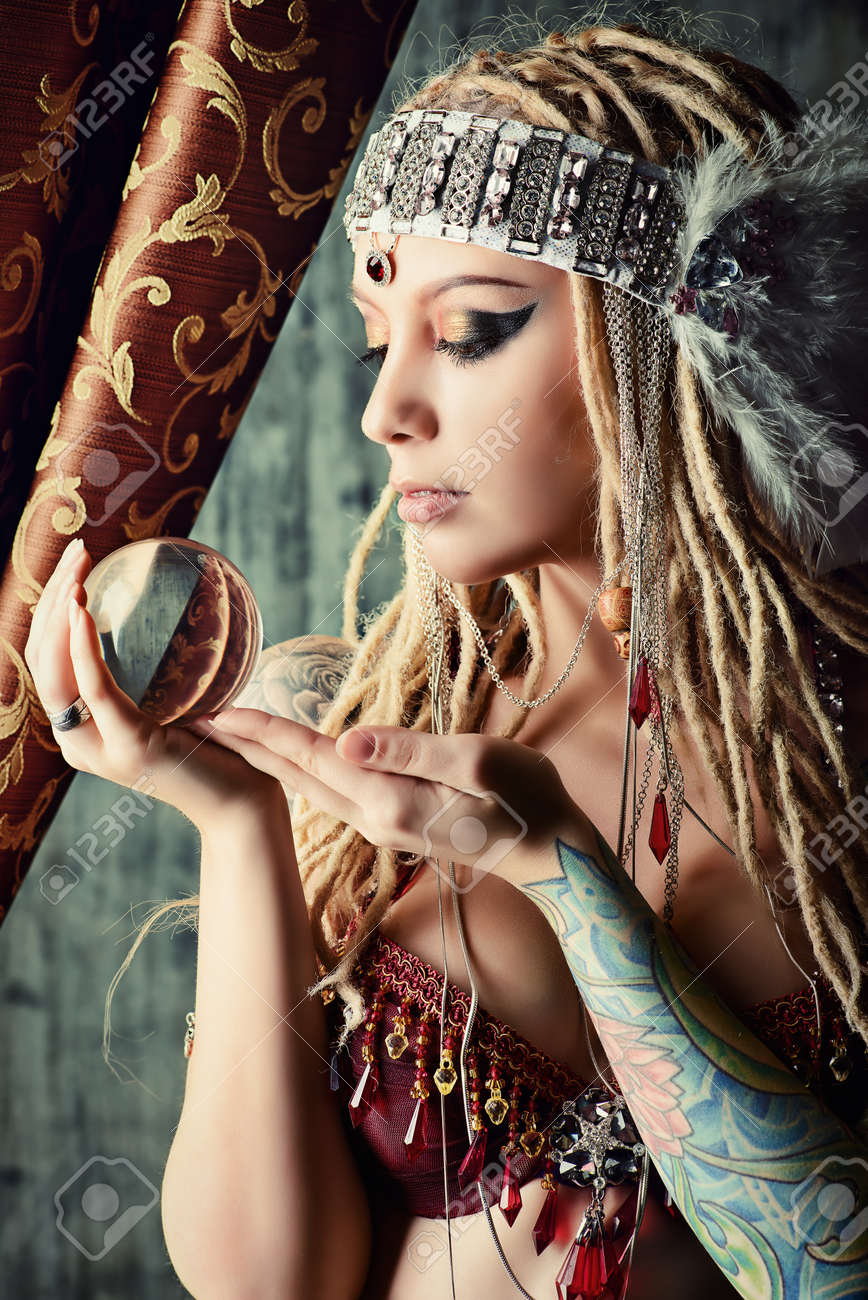 magnificent fortune teller holding crystal ball divination stock