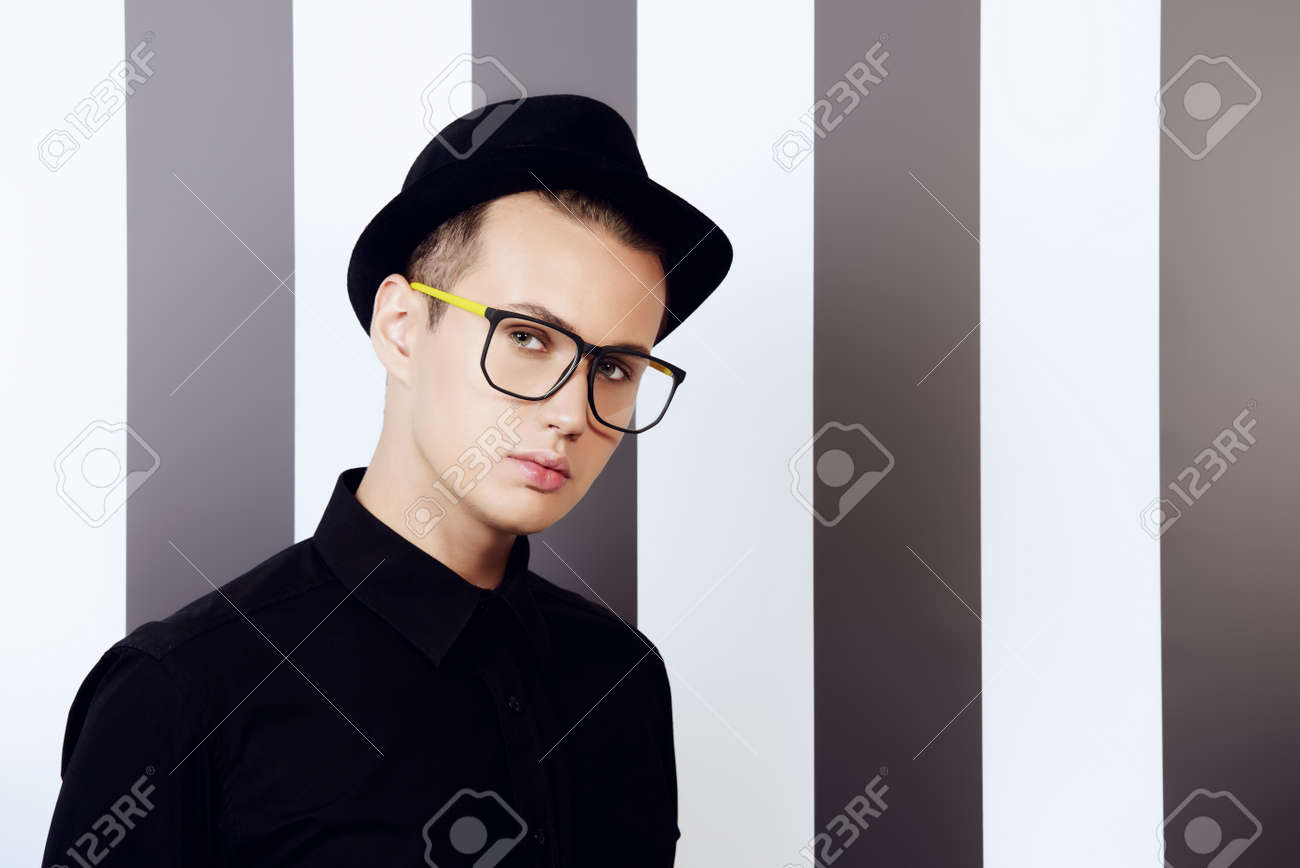 wearing a hat with glasses