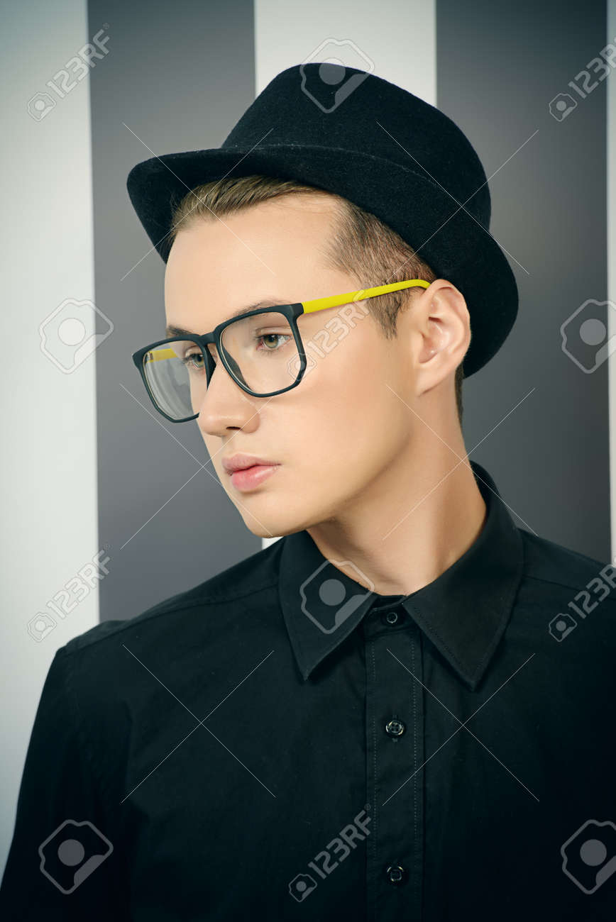 wearing a hat with glasses
