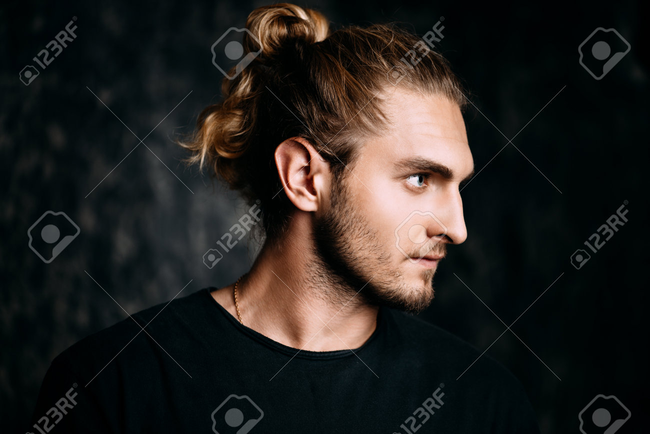Portrait Of A Modern Young Man With Long Hair Studio Portrait