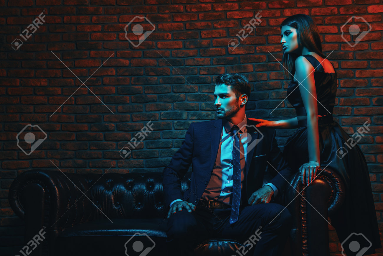 Sexual passionate couple in elegant evening dresses. Luxurious interior. - 96379310 Sexual passionate couple in elegant evening dresses. Luxurious interior. - 96379310