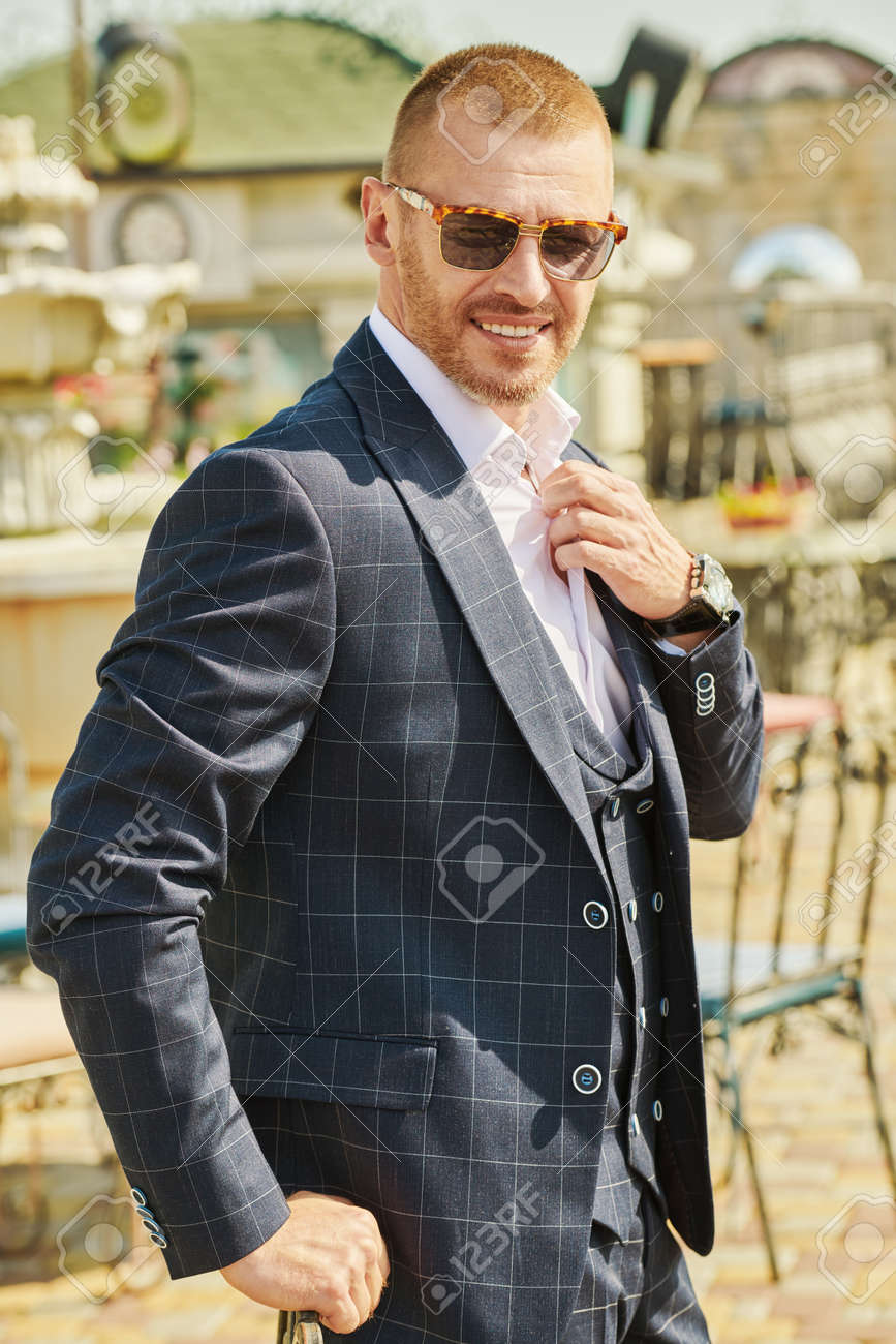 Mature Male model suit Portrait Of Handsome Mature Man In An Elegant Classic Suit Stands On The  Summer Terrace. Male Fashion. Optics, Sunglasses For Men. Stock Photo,  Picture and Royalty Free Image. Image 152252283.