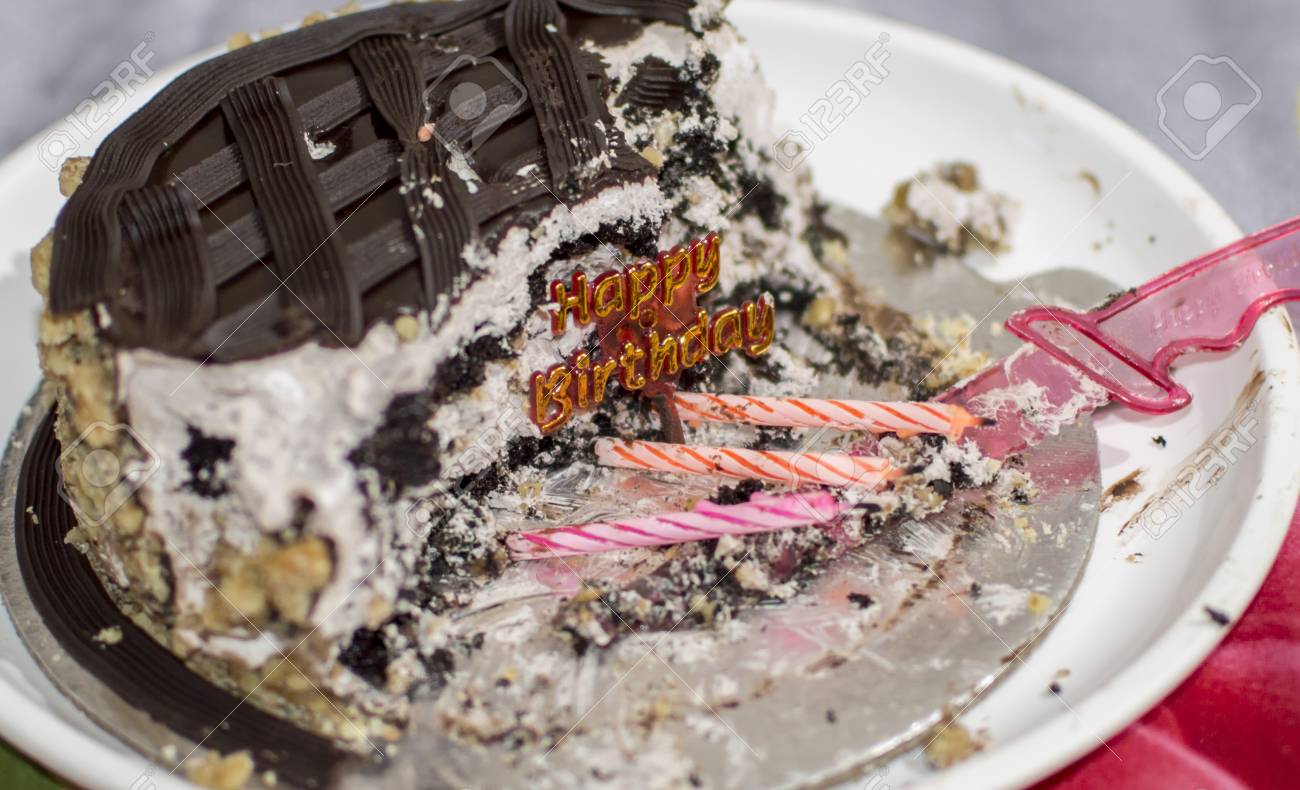 Spoiled Birthday With Old Candles And Cake Stock Photo, Picture and Royalty  Free Image. Image 87733756.