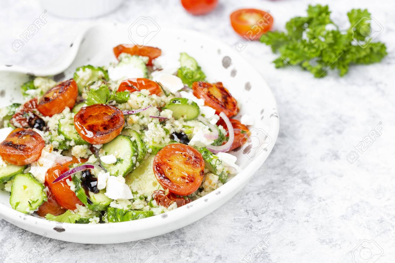 Mediterranean Couscous Salad With Fried Cherry Tomatoes Cucumber Stock Photo Picture And Royalty Free Image Image 128186342