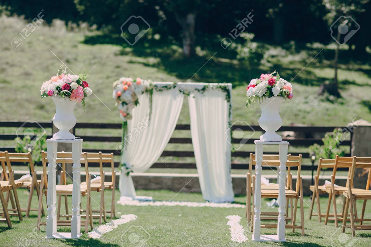 Beautiful Wedding Decorations For The Ceremony Outside In Sunny Weather  Stock Photo, Picture and Royalty Free Image. Image 52376172., image size:1300x866