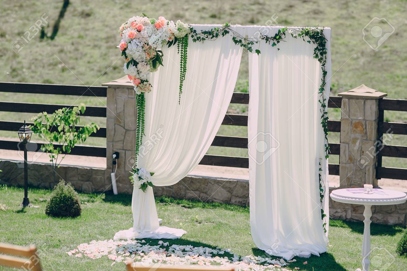 Beautiful Wedding Decorations For The Ceremony Outside In Sunny Weather  Stock Photo, Picture and Royalty Free Image. Image 56745175., image size:1300x866