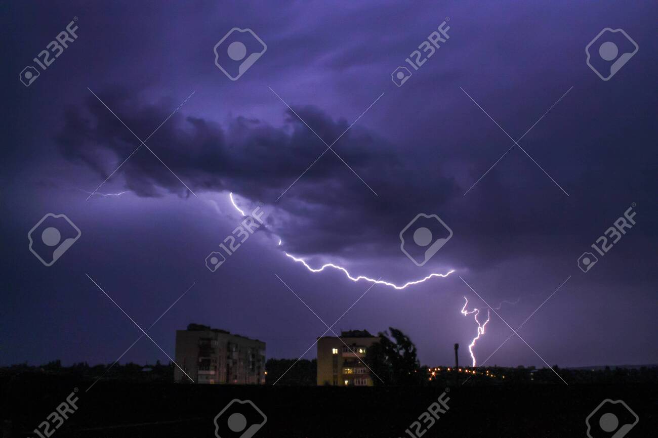 Lightning In Big Cloud Over Night City Black Stormy Backdrop Stock Photo Picture And Royalty Free Image Image