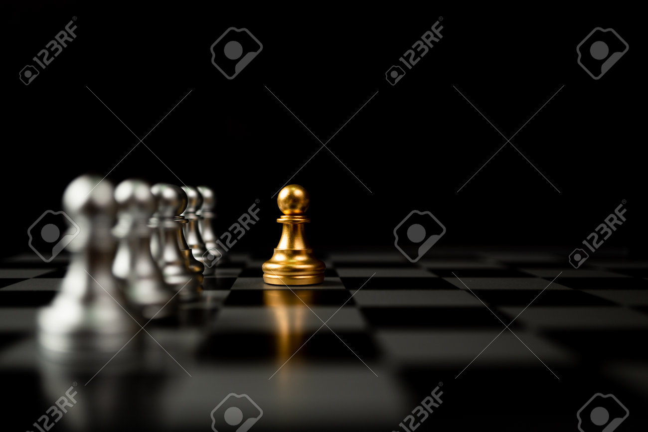 The gold horse, knight chess piece standing with falling silver pawn chess  pieces on chessboard on white background with copy space. Leadership,  winner, competition, and business strategy concept. Photos