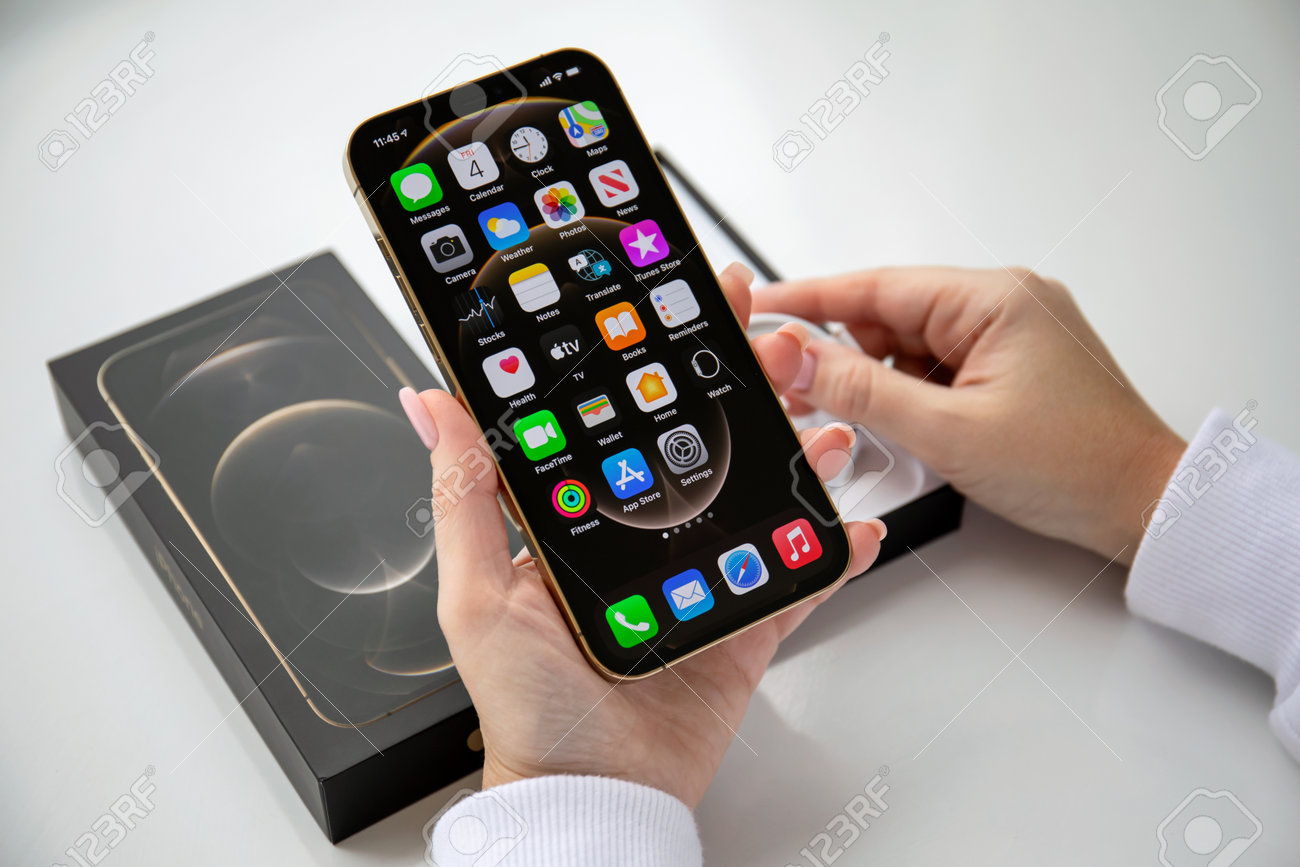 Alanya Turkey December 4 Woman Hand Holding Box Iphone 12 Pro Max Gold With Home Screen Ios 14 Under The Table Stock Photo Picture And Royalty Free Image Image