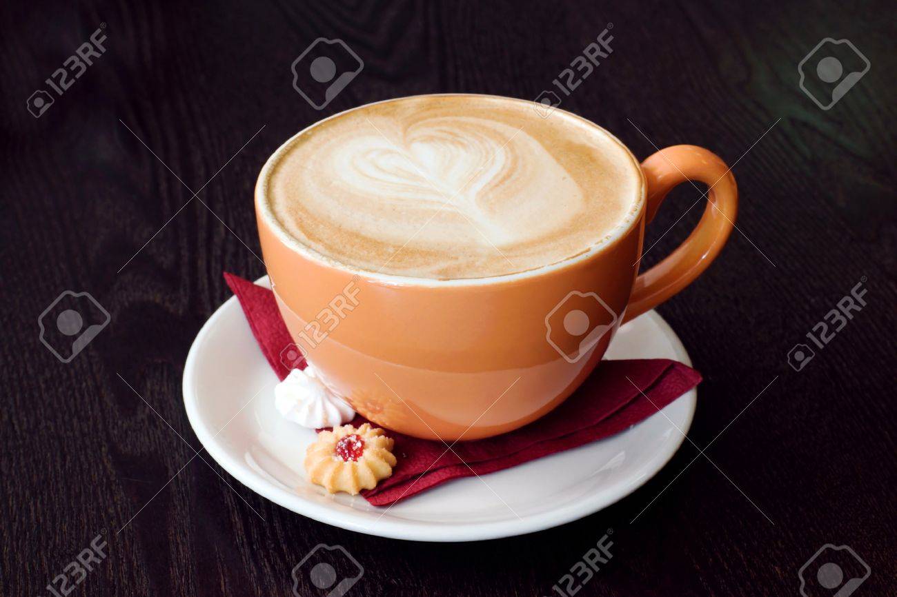 cup of cofee on brown wood table stock photo picture and royalty cofee