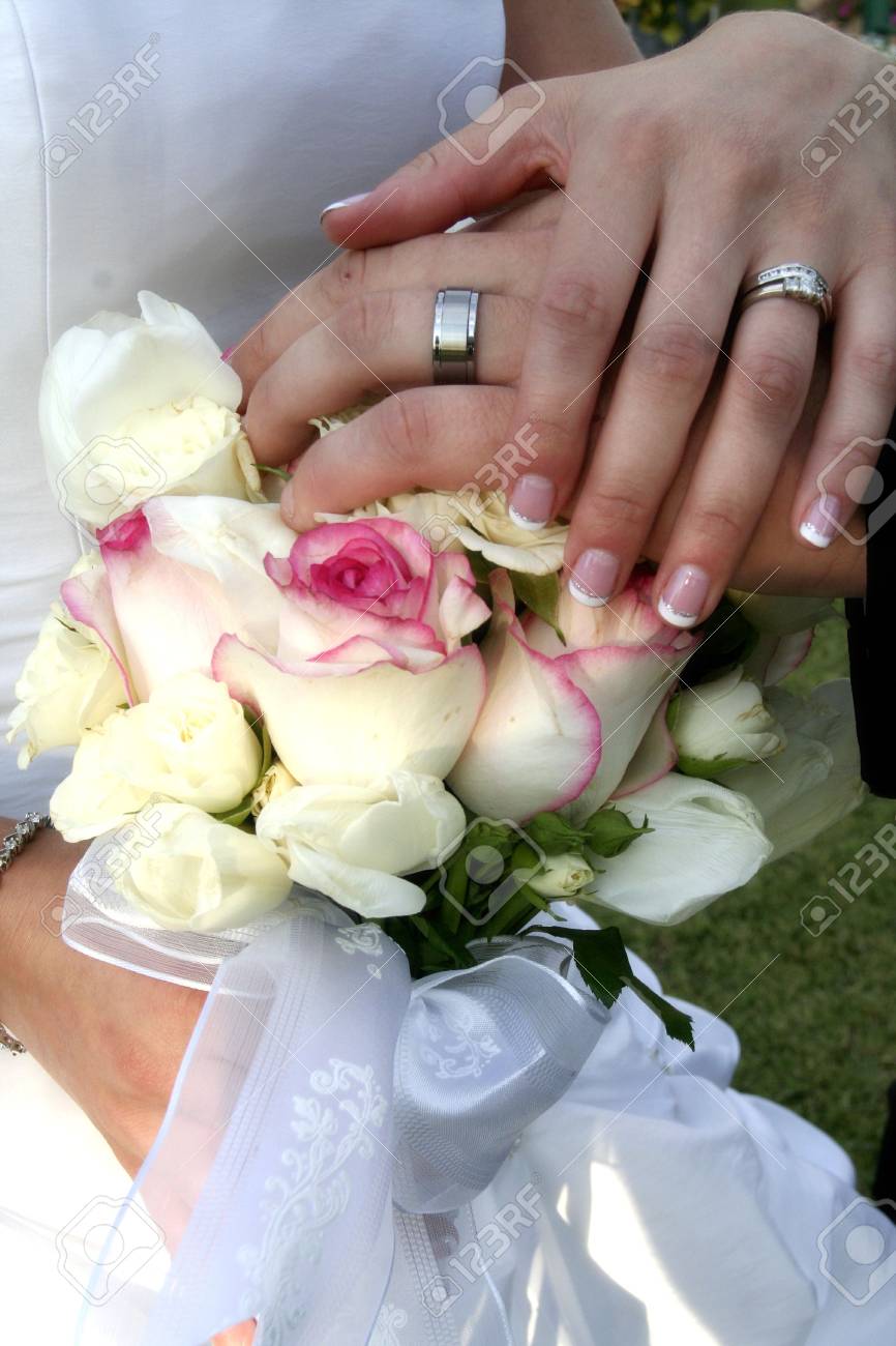 bride and groom show off their rings - 636551 bride and groom show off their rings - 636551