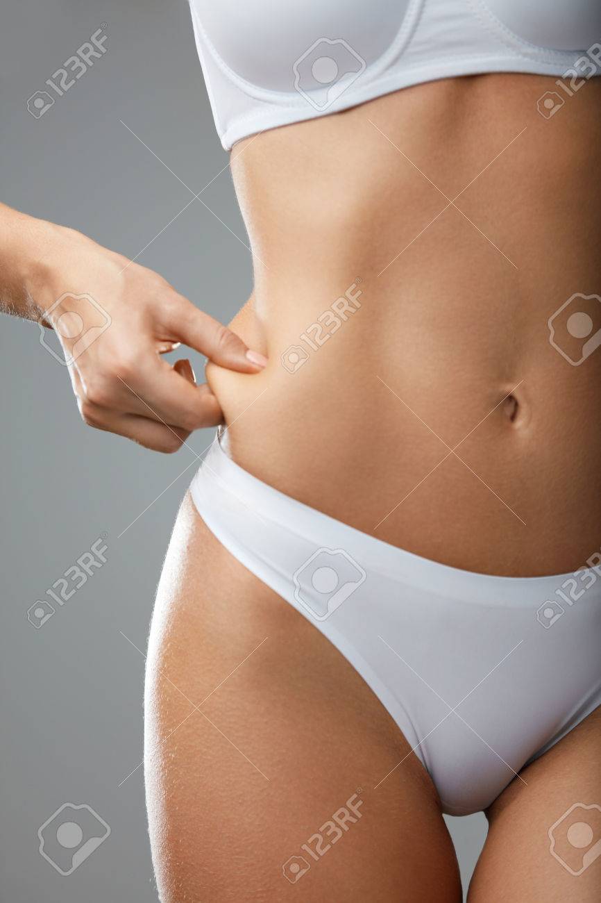 Ihor PukhnatyyHand Pinching Skin Measuring Body Fat