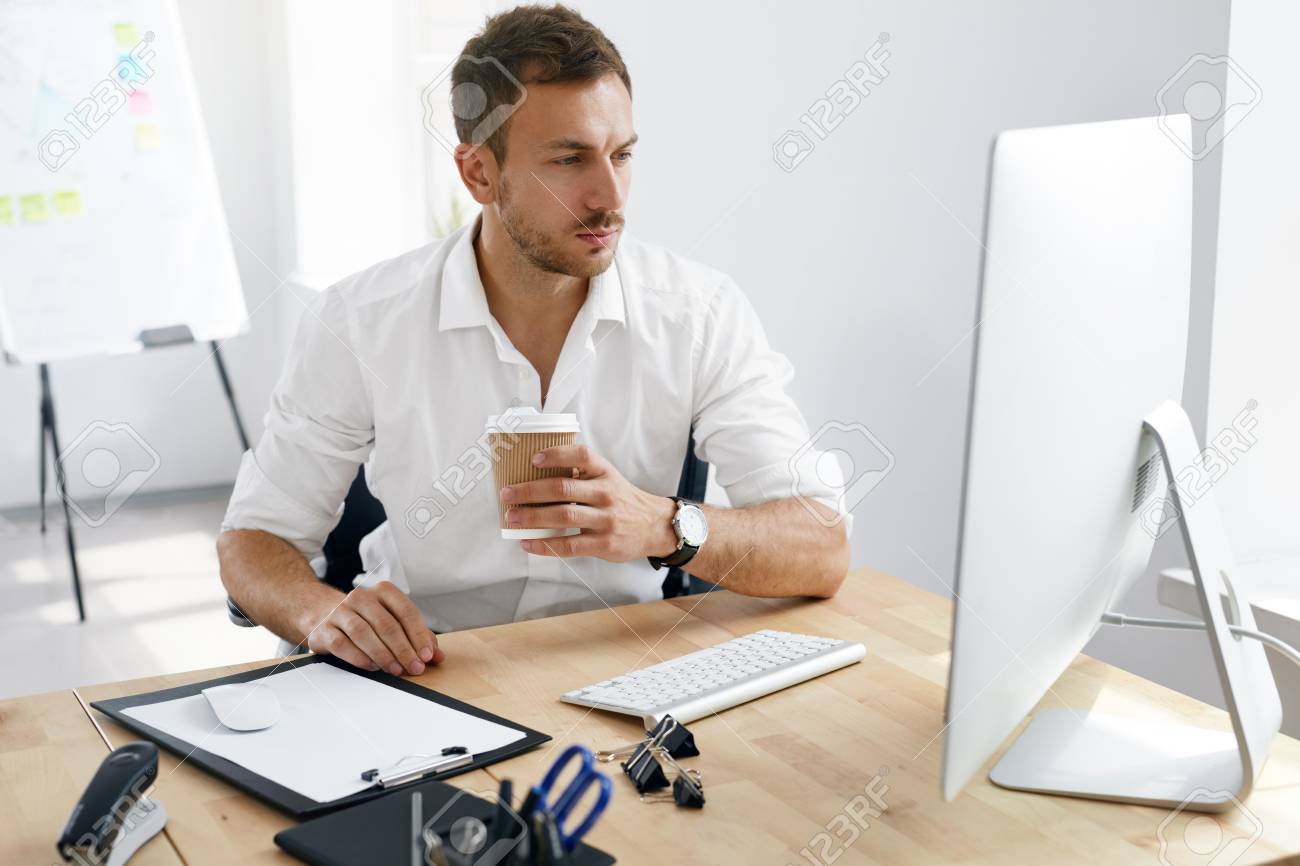Young Business Man Working On Computer In Office. Portrait Of.. Stock Photo, Picture And Royalty Free Image. Image 91511117.
