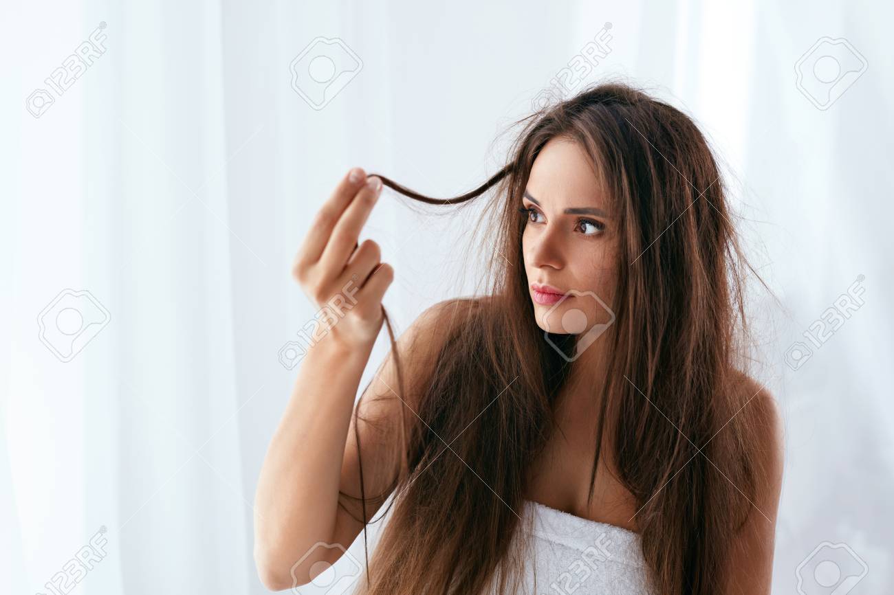Hair Problem Woman With Dry And Damaged Long Hair Disheveled Stock Photo Picture And Royalty Free Image Image 111009973
