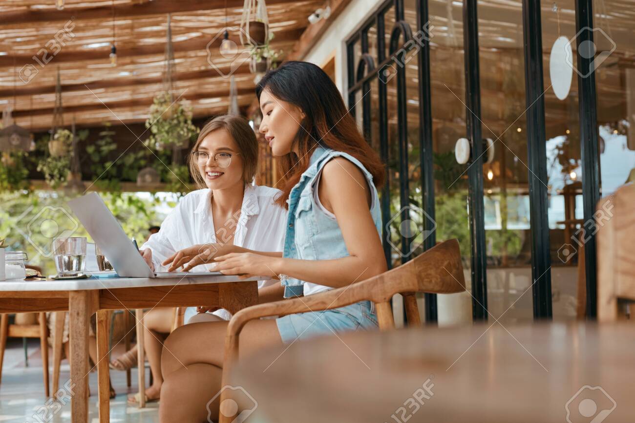 Online Meeting At Cafe Business Women Chatting On Laptop At Stock Photo Picture And Royalty Free Image Image 150540315