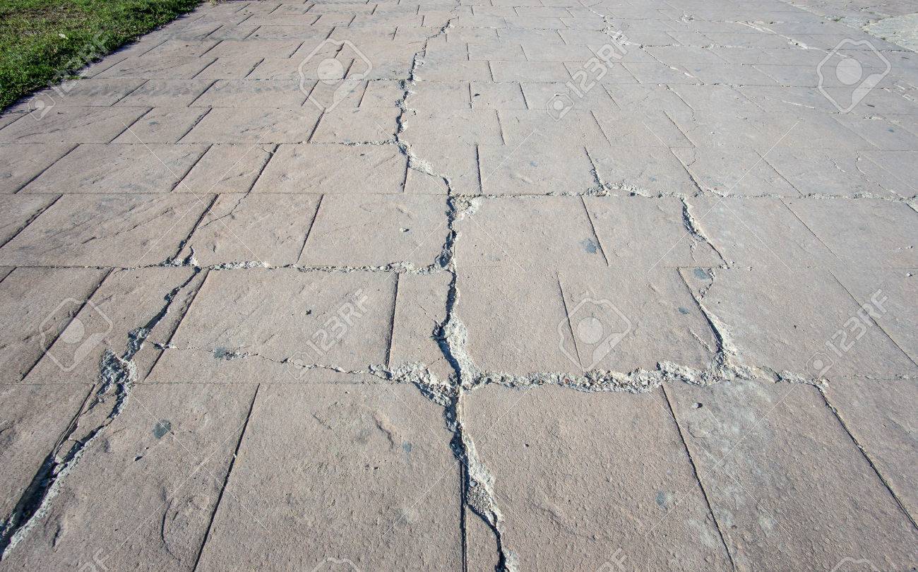 Big Break On Damaged Stamped Fissure Concrete Cracked Pavement Timeworn Appearance Colors Textures Of Paving Slate Stone Tile On Cement Broken Flooring Exterior Decorative Surfaces Stock Photo Picture And Royalty Free Image