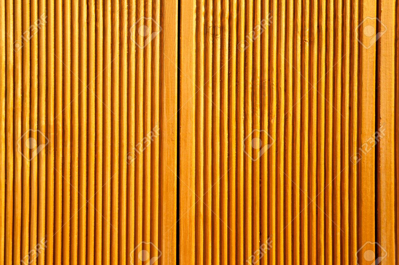Yellow Wooden Wall Panels Decorated With Vertical Grooves Abstract Stock Photo Picture And Royalty Free Image Image