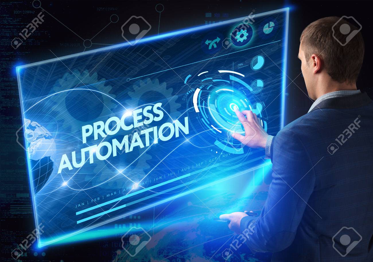 Business, Technology, Internet and network concept. Technology future. Young businessman, working on the smartphone of the future, clicks on the virtual display button: Process Automation - 61500615 Business, Technology, Internet and network concept. Technology future. Young businessman, working on the smartphone of the future, clicks on the virtual display button: Process Automation - 61500615