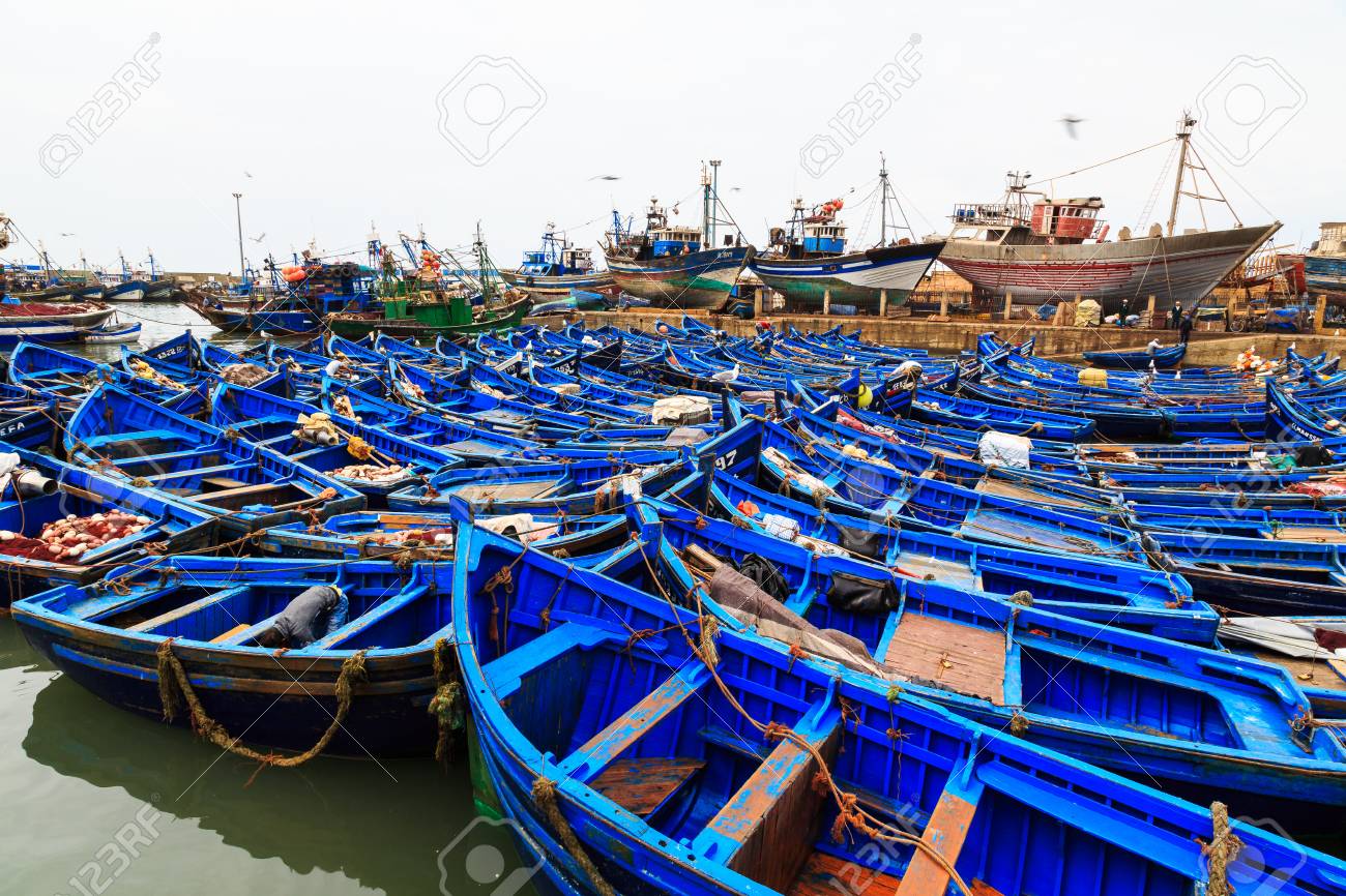 https://previews.123rf.com/images/pwollinga/pwollinga1702/pwollinga170200053/74528829-small-blue-fishing-boats-in-the-harbor-of-essaouira-morocco.jpg