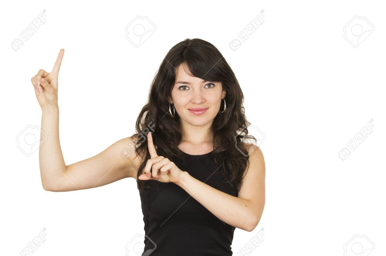 ブラック トップの上分離白を人差し指でポーズをとっての若いブルネット美女 の写真素材 画像素材 Image