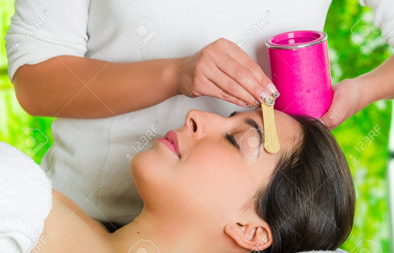 Closeup Womans Face Receiving Facial Hair Waxing Treatment Hand