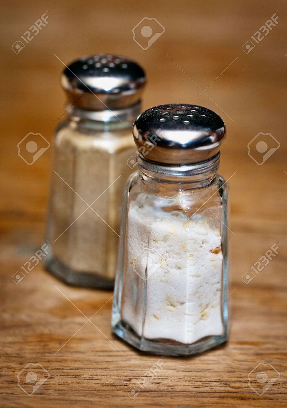 Salt Shaker Stock Photos Pictures Royalty Free Salt Shaker - Salt Shaker Salt Shaker And Pepper Shaker On Wooden Table salt shaker stock photos pictures royalty free salt shaker - salt shaker salt shaker and pepper shaker on wooden table