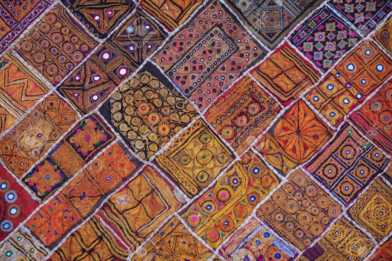 Traditional, intricately patterned, Indian wall tapestry, for sale at a shop in Jaisalmer, Rajasthan, India. - 90252436